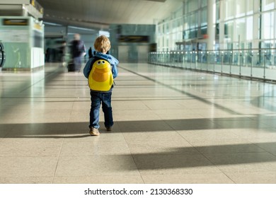 Cute  Baby Boy Waiting Boarding To Flight In Airport Transit Hall Near Departure Gate. Active Family Lifestyle Travel By Air With Child On Vacation