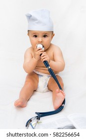 Cute Baby Doctor With A Stethoscope And A Book