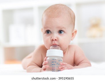 Cute Baby Drinking Water From Bottle