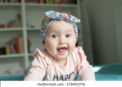 Cute Baby Girl With Hairband (ribbon), Smiling, Laughing.