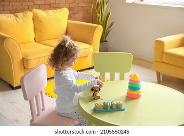 Cute Baby Girl Playing At Home