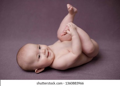 Cute Baby Girl. A Series Of Photos With Her Growing Up. Studio Light. Pink Color Palette.