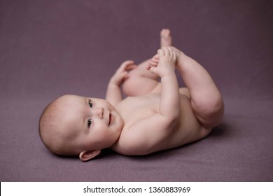 Cute Baby Girl. A Series Of Photos With Her Growing Up. Studio Light. Pink Color Palette.