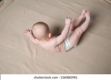 Cute Baby Girl. A Series Of Photos With Her Growing Up. Studio Light. Pink Color Palette.