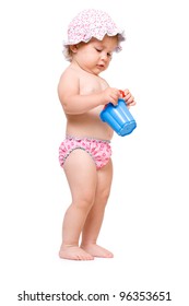 Cute Baby Girl In Swimming Pants And Sunhat Playing, Isolated Over White Background