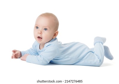 Cute Baby lying on Stomach over White Background in Cotton Babies Bodysuit. Infant four month Child in Blue Onesies Clothes crawling looking a Side. Boy in Pajama isolated