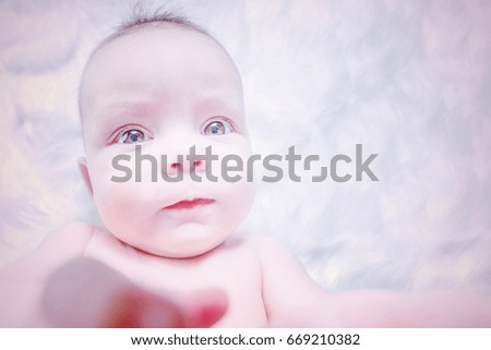 Similar – Nude baby posing in her mother’s arms