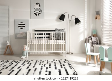 Cute Baby Room Interior With Crib And Decor Elements