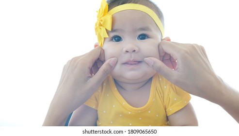 Cute Baby Sleeping On Mom Shoulder. Mother Hold Little Baby And Lulls Her Newborn Baby In Her Arms