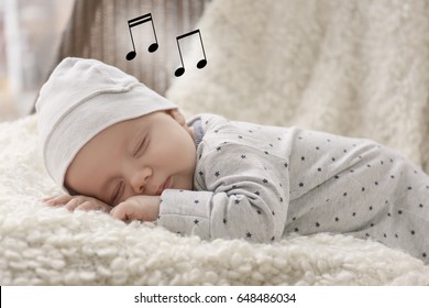 Cute Baby Sleeping On Plaid. Lullaby Songs And Music Concept