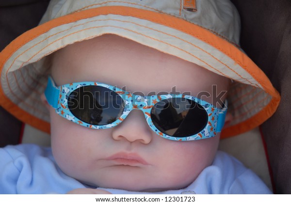 baby sun hat and sunglasses