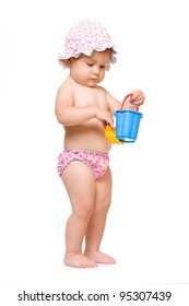 Cute Baby In Swimming Pants And Sunhat Playing, Isolated Over White