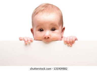cute baby with white blank banner in hand isolated