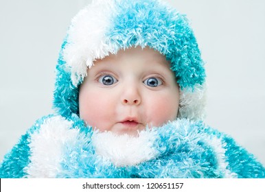 Cute Baby At Winter Background