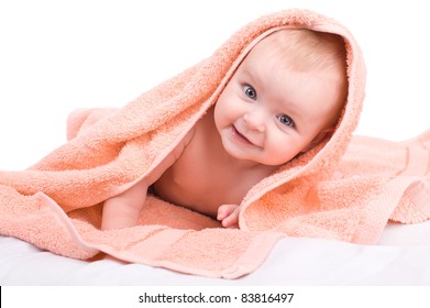 A Cute Baby Wrapped In A Towel.