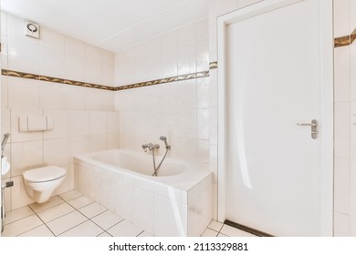 Cute Bathroom Design With Tiled Floor In A Luxury Home