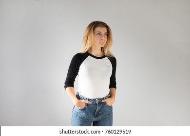 Cute Beautiful Natural Attractive Blonde In Blue Denim Jeans And Simple Three Quarter Baseball Tee Tshirt For Mockup Or Design On Isolated Grey Background