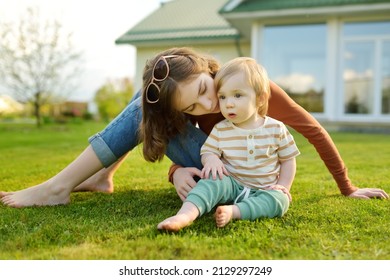 Cute Big Sister Cuddling With Her Toddler Brother. Adorable Teenage Girl Holding Baby Boy. Children With Large Age Gap. Big Age Difference Between Siblings. Big Family.