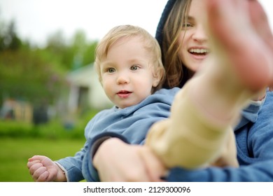 Cute Big Sister Cuddling With Her Toddler Brother. Adorable Teenage Girl Holding Baby Boy. Children With Large Age Gap. Big Age Difference Between Siblings. Big Family.