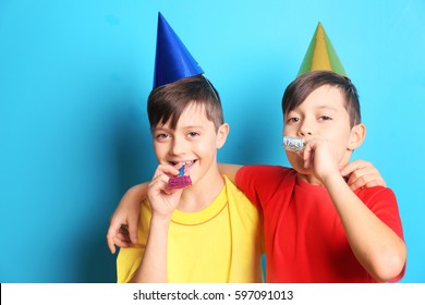 Cute Birthday Boys With Party Hats On Blue Background