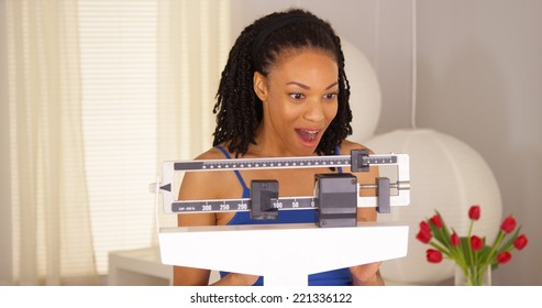 Cute Black Woman Dancing On Scales