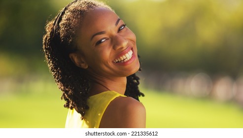 Cute Black Woman Smiling In A Park