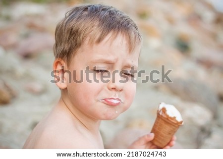 Similar – Image, Stock Photo Lovely boy eating an ice cream on the beach