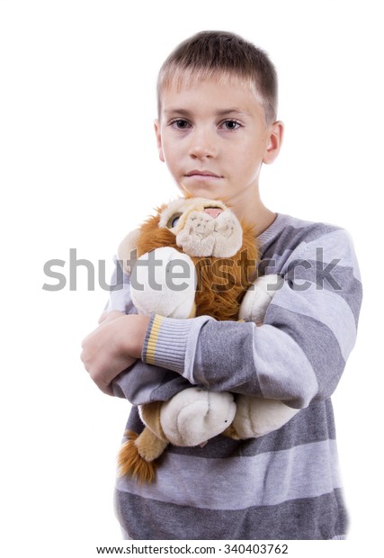 holding a stuffed animal
