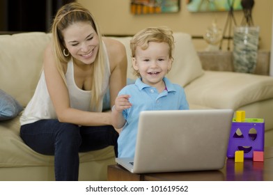 Cute blond kid playing and having fun with her mom