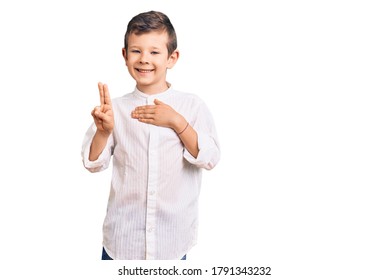 Cute Blond Kid Wearing Elegant Shirt Smiling Swearing With Hand On Chest And Fingers Up, Making A Loyalty Promise Oath 