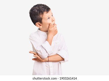 Cute Blond Kid Wearing Elegant Shirt Thinking Worried About A Question, Concerned And Nervous With Hand On Chin 