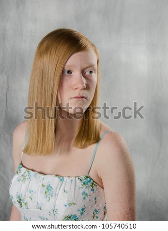 Cute Blond Teenager With Gray Background Cute Blond Teenager With Gray Background