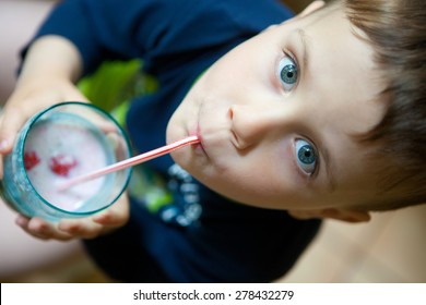 Cute Boy Drinking Smoothie