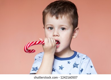 Cute Boy Eating Candy Sticks Red Stock Photo 1242160507 | Shutterstock