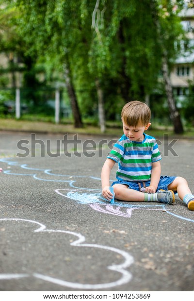 Cute Boy Girl Drawing Chalk On Stock Photo Edit Now 1094253869