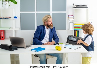 Cute Boy Kid Sitting In Office Chair Self Confident Like Big Boss, Funny Businessman Bossy Child, Director And Powerful Leader Humorous Concept. Business People Talking And Discussing.