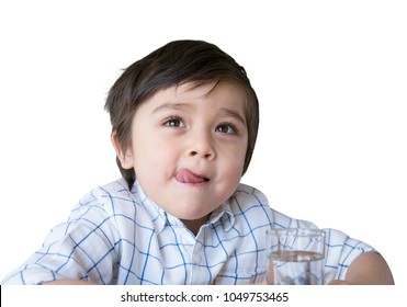 Cute Boy Licking His Dry Lips From Allergies And Holding Grass Of Water In Isolated On White Background,Child Feeling Thirsty And Want To Drink Some Water, Toddler Boy Looking Up With Sticking Tongue