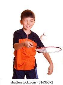 Cute boy playing badminton isolated on white