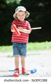 Cute Boy, Playing Croquet