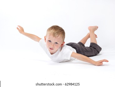 cute boy playing on white background