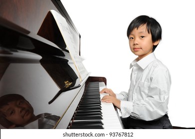 Cute Boy Playing Piano