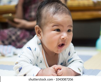 A Cute Boy Portrait, Try To Crawl And Drool.