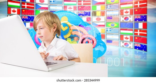 Cute boy using laptop against composite image of cloud computing drawer