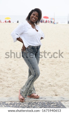 Cute Brazilian girl on the beach of Copacabana in Rio de Janeiro, March 2020