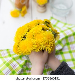 Cute Bright Bouquet Of Dandelions On A White Table. Hello Spring Concept Dandelion, Hello Spring, Spring Flowers. Dandelion Jam As Healthy Food.