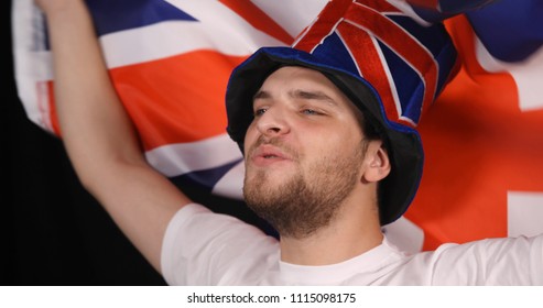 Cute British Supporter Man Celebrating Brexit Exit From European Union While Waving UK Flag