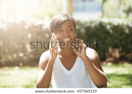 Similar – Black woman making the gesture of the horns