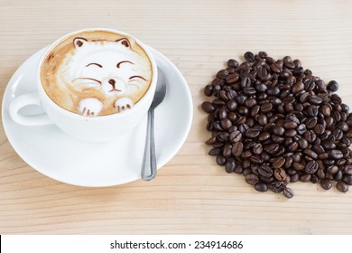 Cute Cat Latte Art Coffee Cup On A Wooden Table