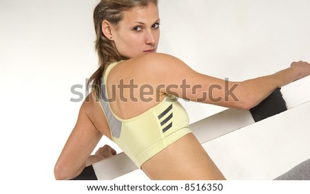 Cute caucasian athletic model with barrier