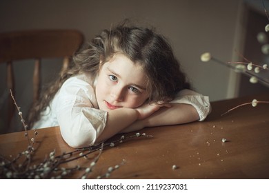 Cute Caucasian Child Girl With Spring Bouquet Of Willow. Easter And Palm Sunday.